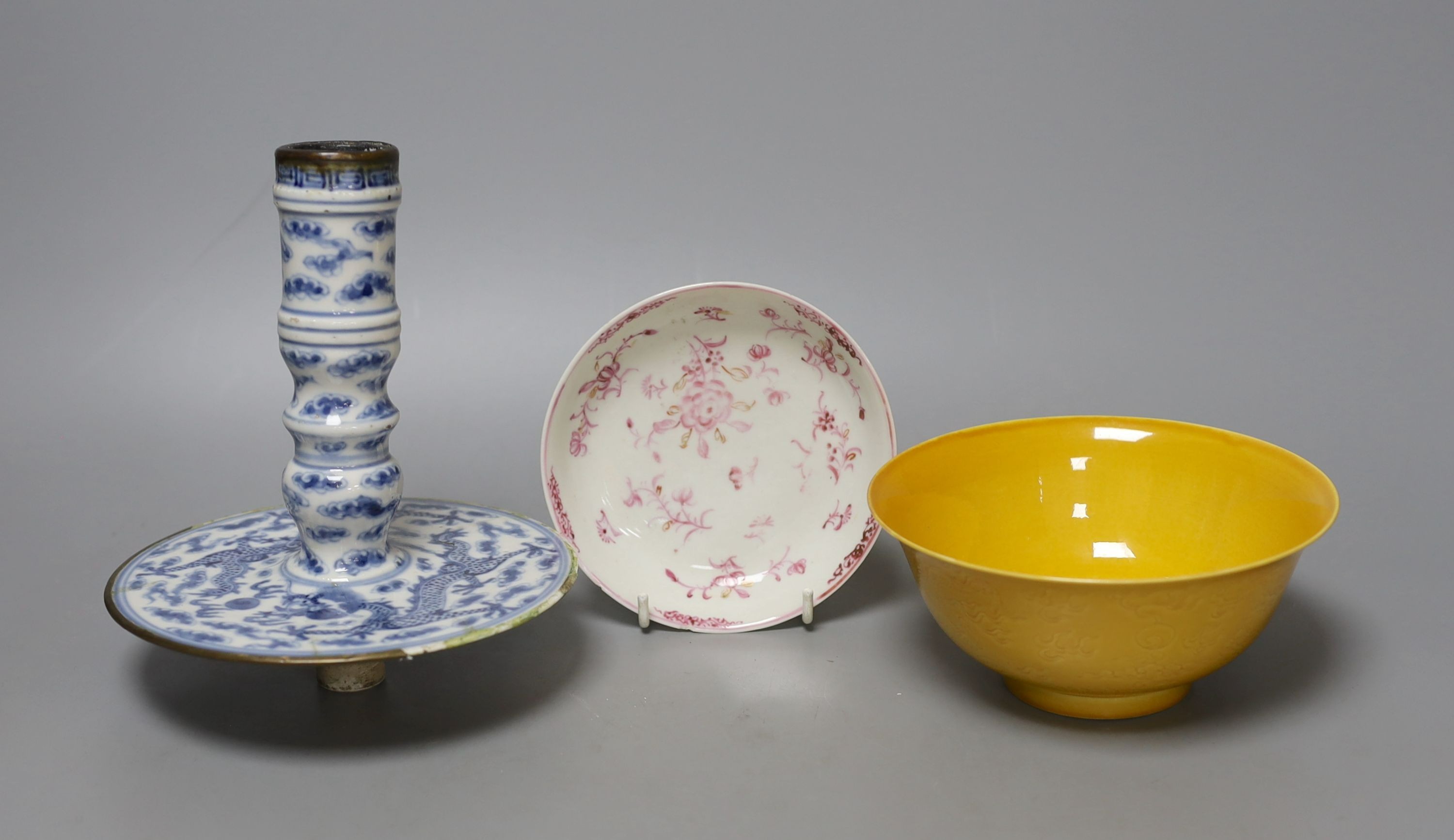 Three Chinese ceramics, including a yellow bowl with inscription to base, 7cm tall, blue and white dragon pattern candlestick mount and export dish